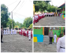 BHABINKAMTIBMAS POLSEK NGIMBANG MELAKSANAKAN KEGIATAN DALAM RANGKA SEBAGAI PEMBINA UPACARA BENDERA