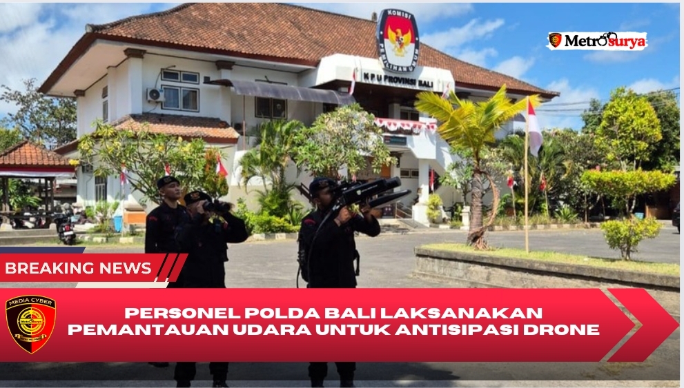Personel Polda Bali Laksanakan Pemantauan Udara untuk Antisipasi Drone Liar di Sekitar Kantor KPU Provinsi Bali
